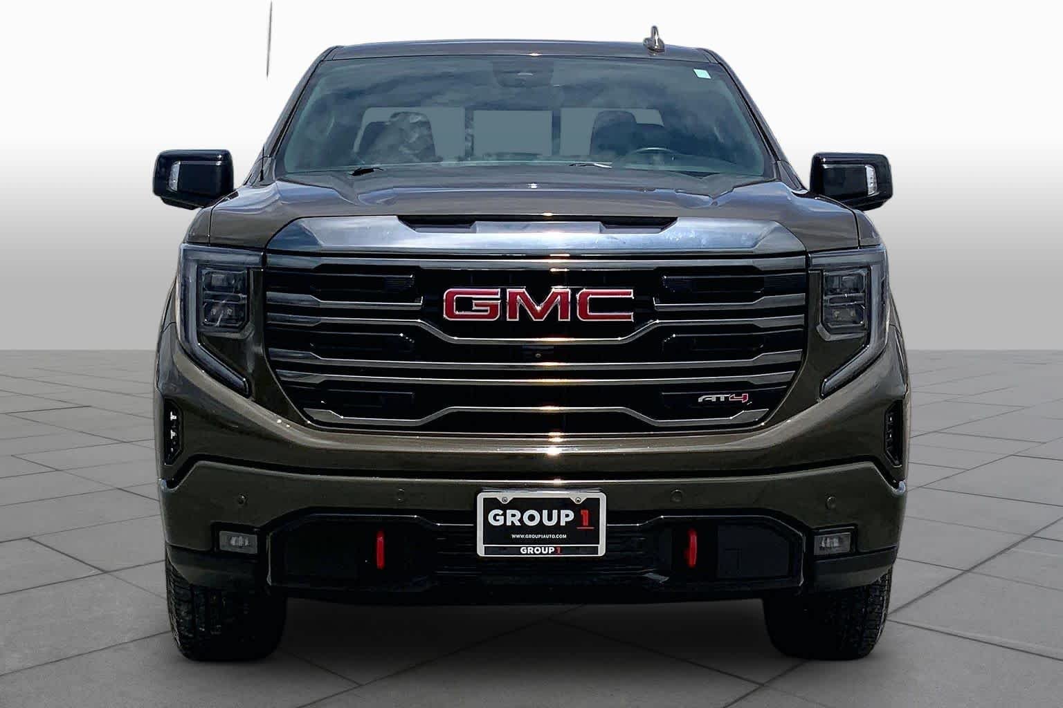 Used 2023 Deep Bronze Metallic GMC AT4 image 4