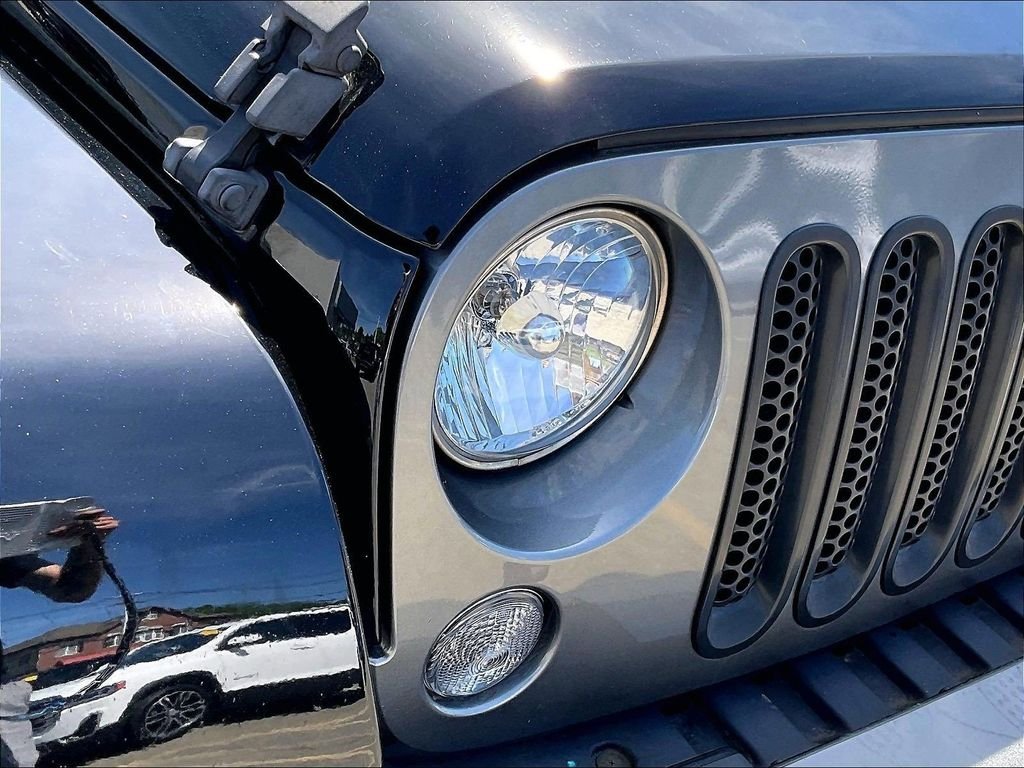 Used 2015 Black Jeep Unlimited Freedom Edition image 32