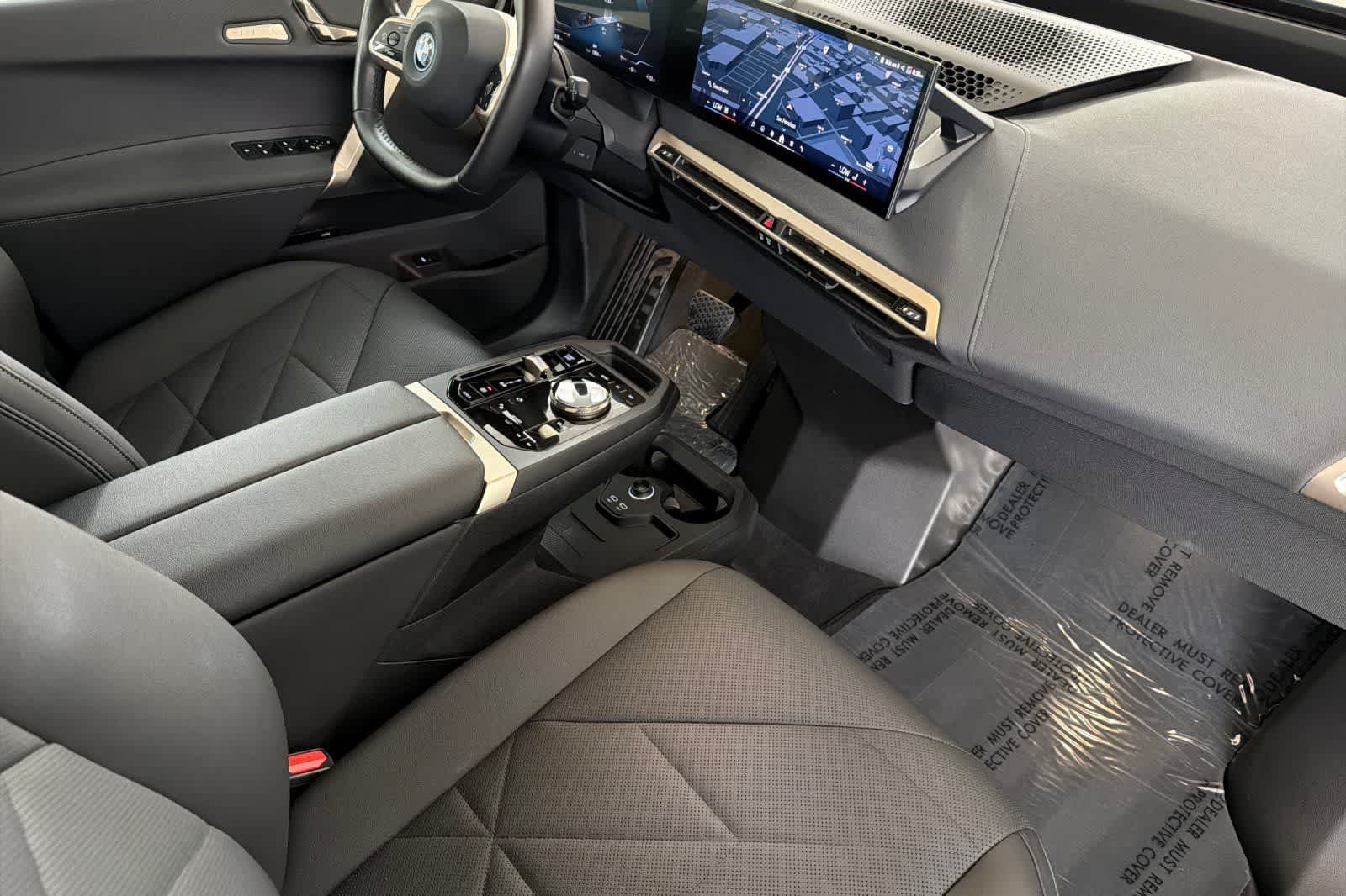 Used 2024 Black Sapphire Metallic BMW xDrive50 image 16