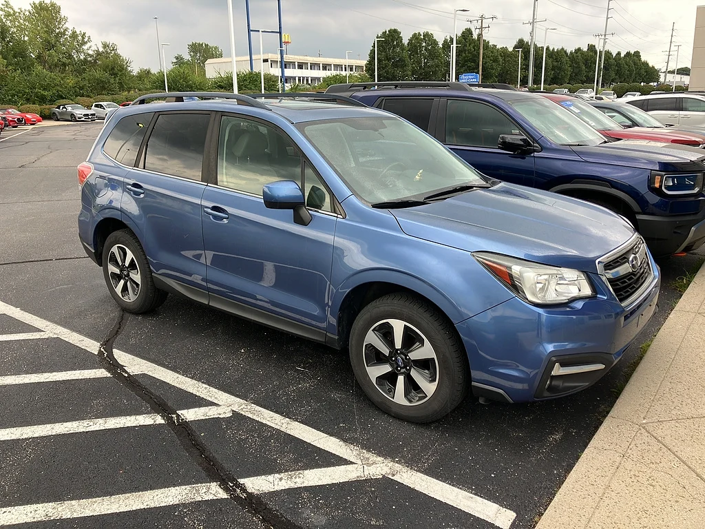 Used 2017 Quartz Blue Pearl Subaru 2.5i Limited image 1