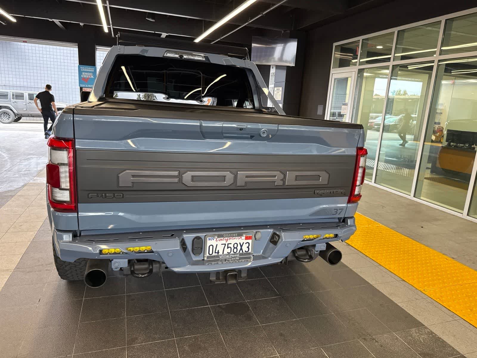 Used 2023 Azure Gray Metallic Tri-Coat Ford Raptor image 17