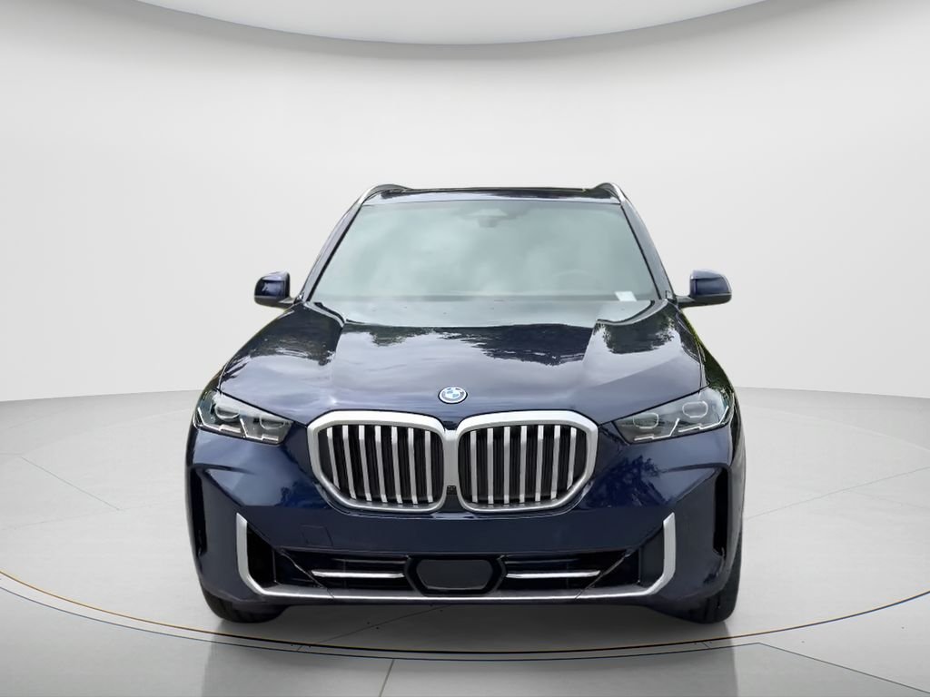 New 2026 Tanzanite Blue II Metallic BMW xDrive50e image 3