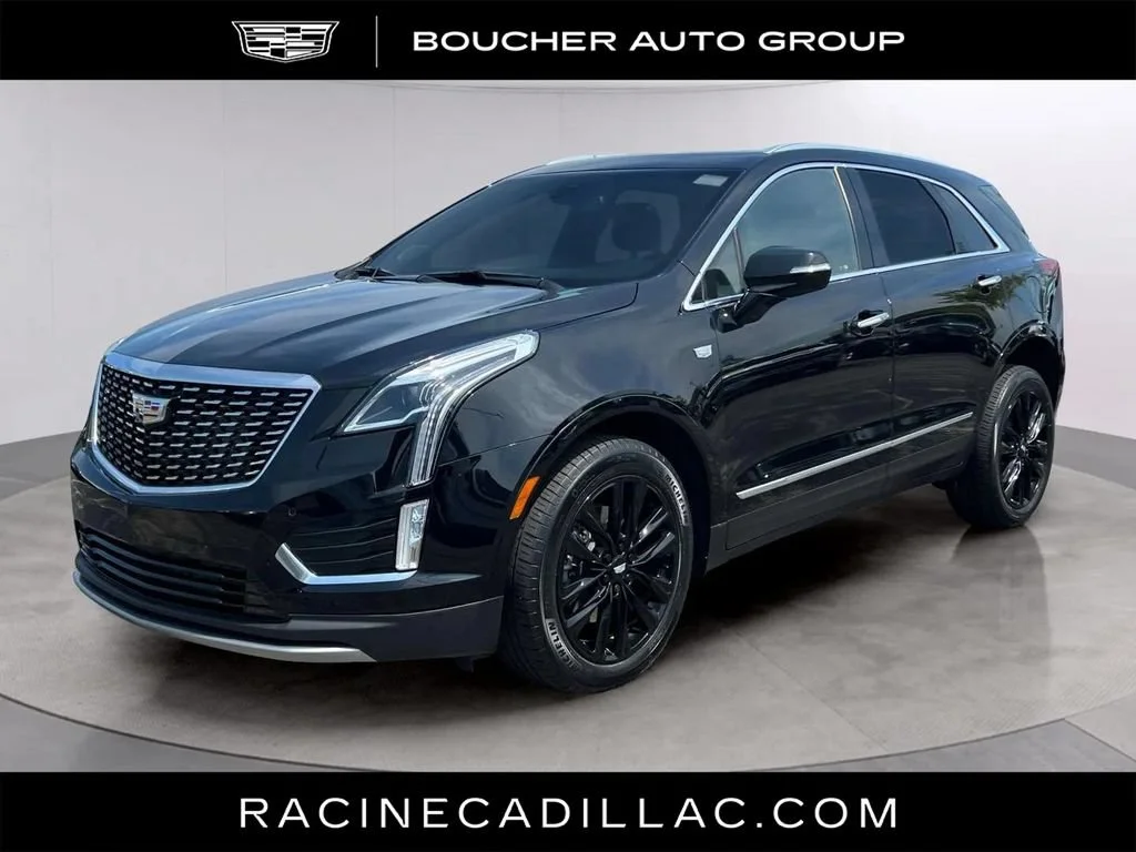Used 2021 STELLAR BLACK METALLIC Cadillac AWD Premium Luxury image 1