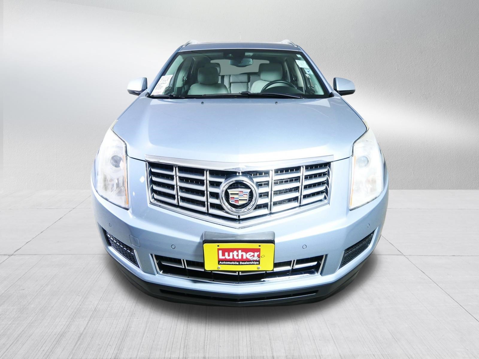 Used 2014 Cadillac SRX Luxury Collection with VIN 3GYFNBE31ES582467 for sale in Brooklyn Center, MN