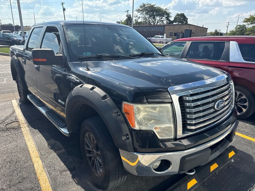 Used 2012 Black Ford XLT image 1