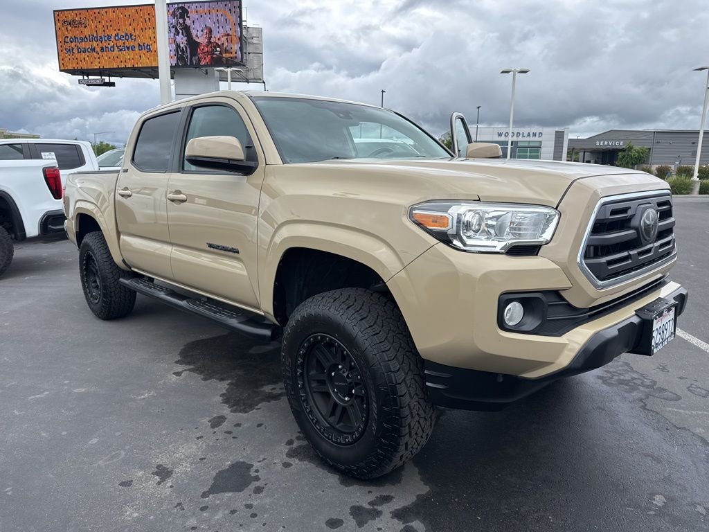 Brown (Tan) 2019 Toyota Tacoma SR5 I4 Double Cab RWD Pickup Truck 4X2