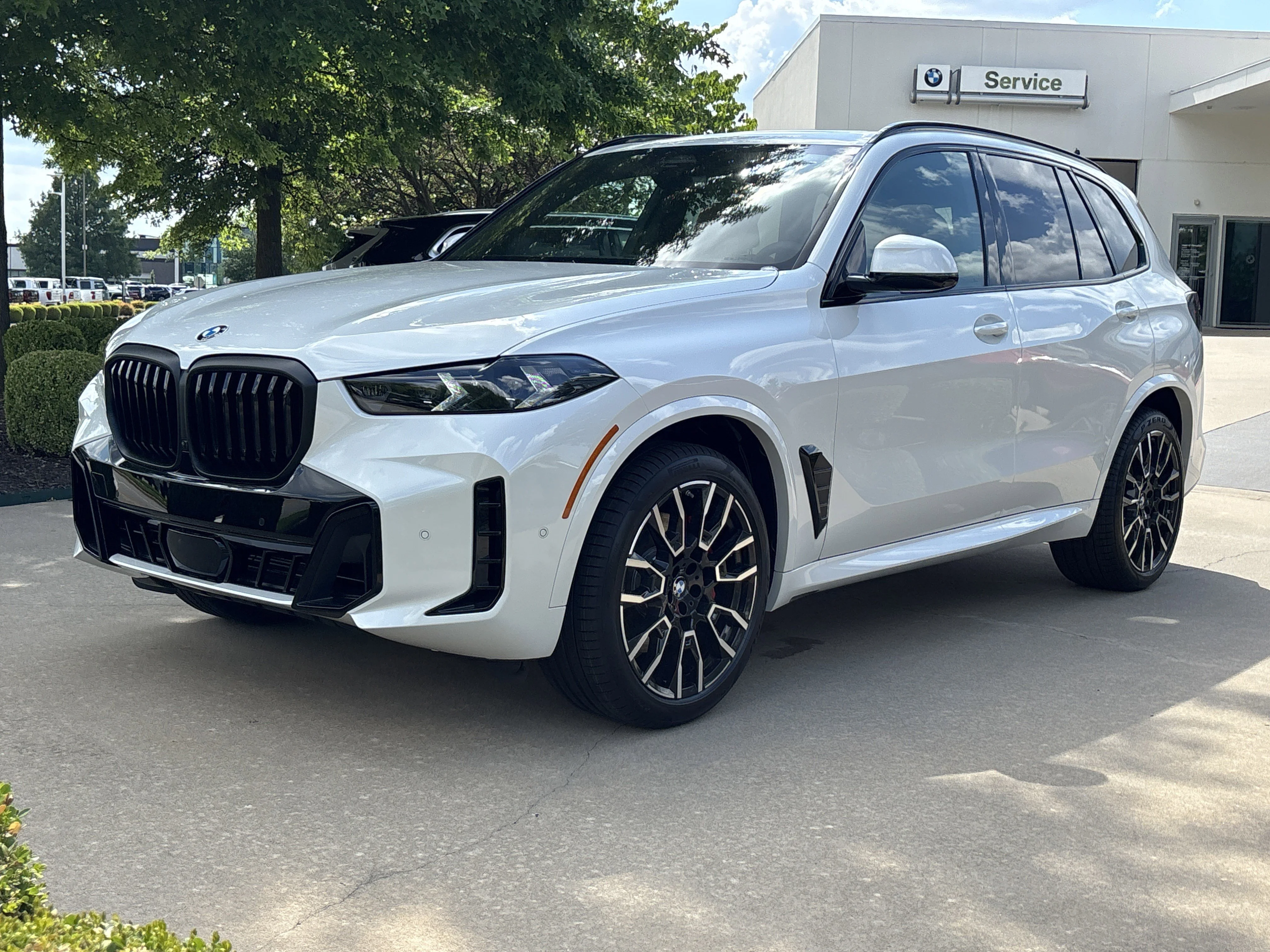New 2026 MINERAL WHITE BMW xDrive40i image 1