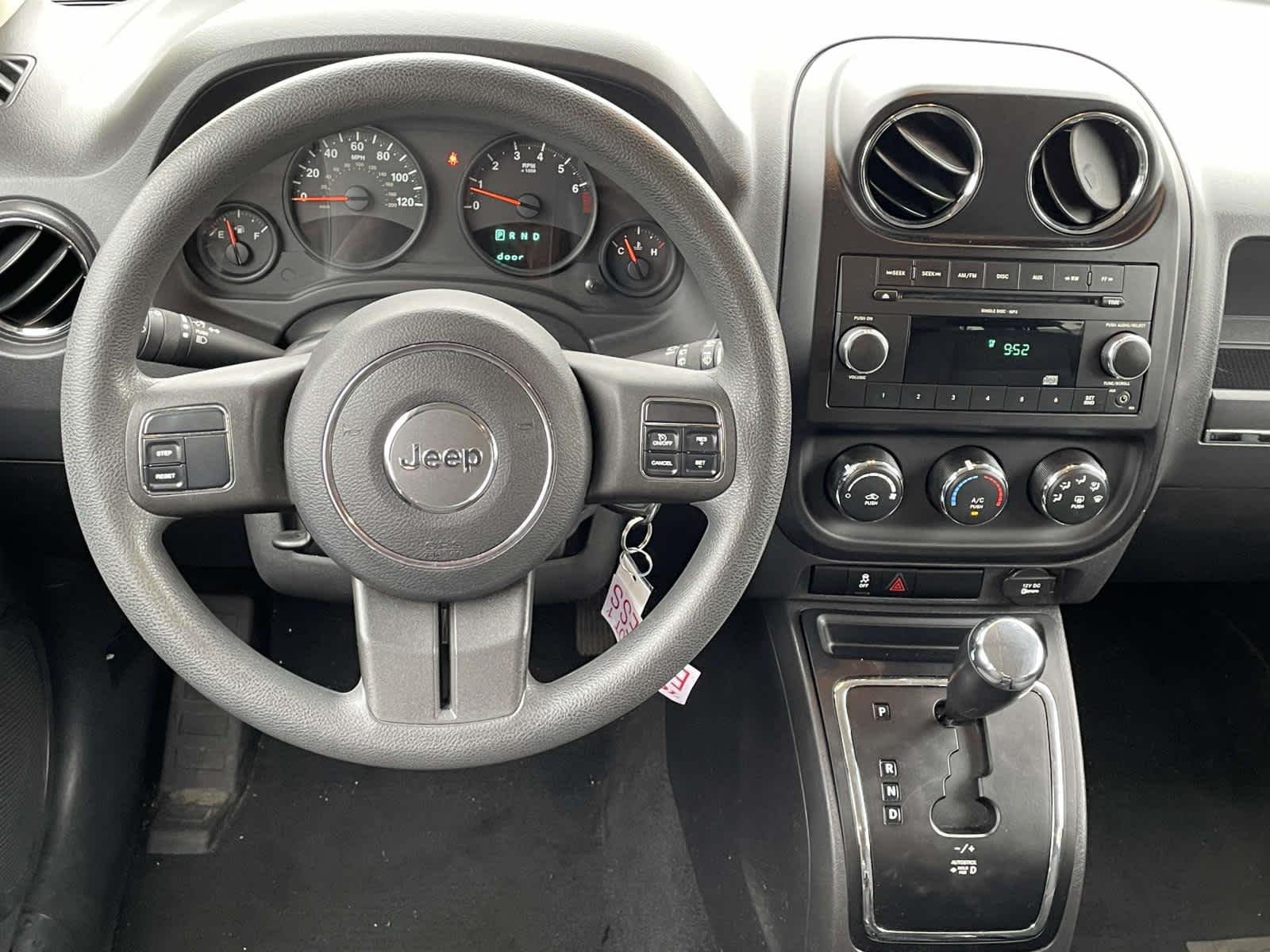 Used 2011 Blackberry Pearl Jeep Sport image 2