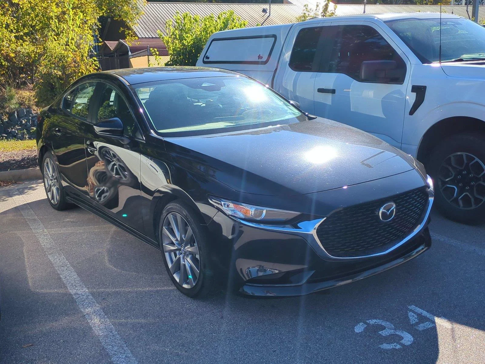 Used 2024 JET BLACK MICA MAZDA PREF image 3