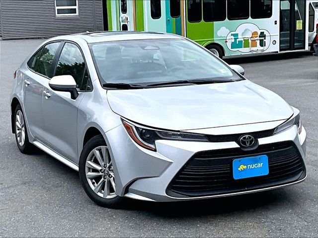 Used 2023 Silver Toyota LE image 1