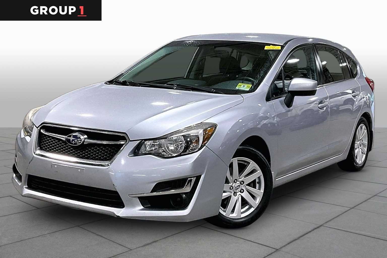 Pre-Owned 2015 Subaru Impreza 2.0i Premium
