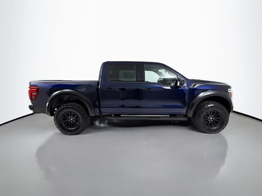 Used 2024 Antimatter Blue Metallic Ford Raptor 4WD SuperCrew 5.5