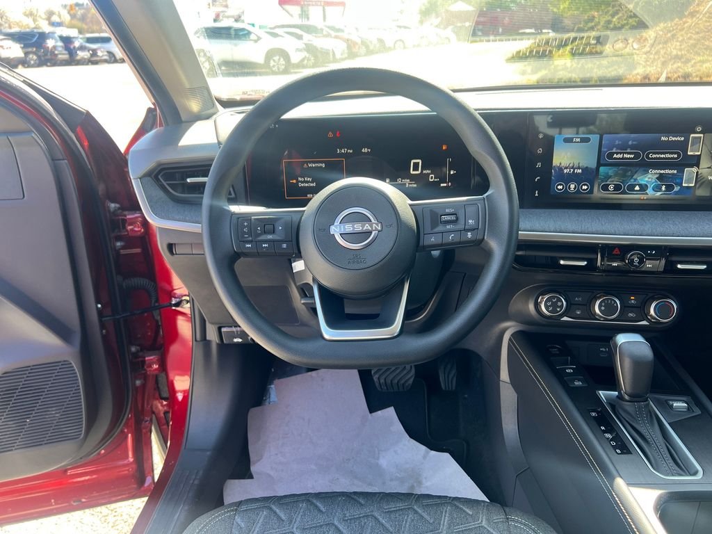 Certified Used 2025 Red Nissan SV image 15