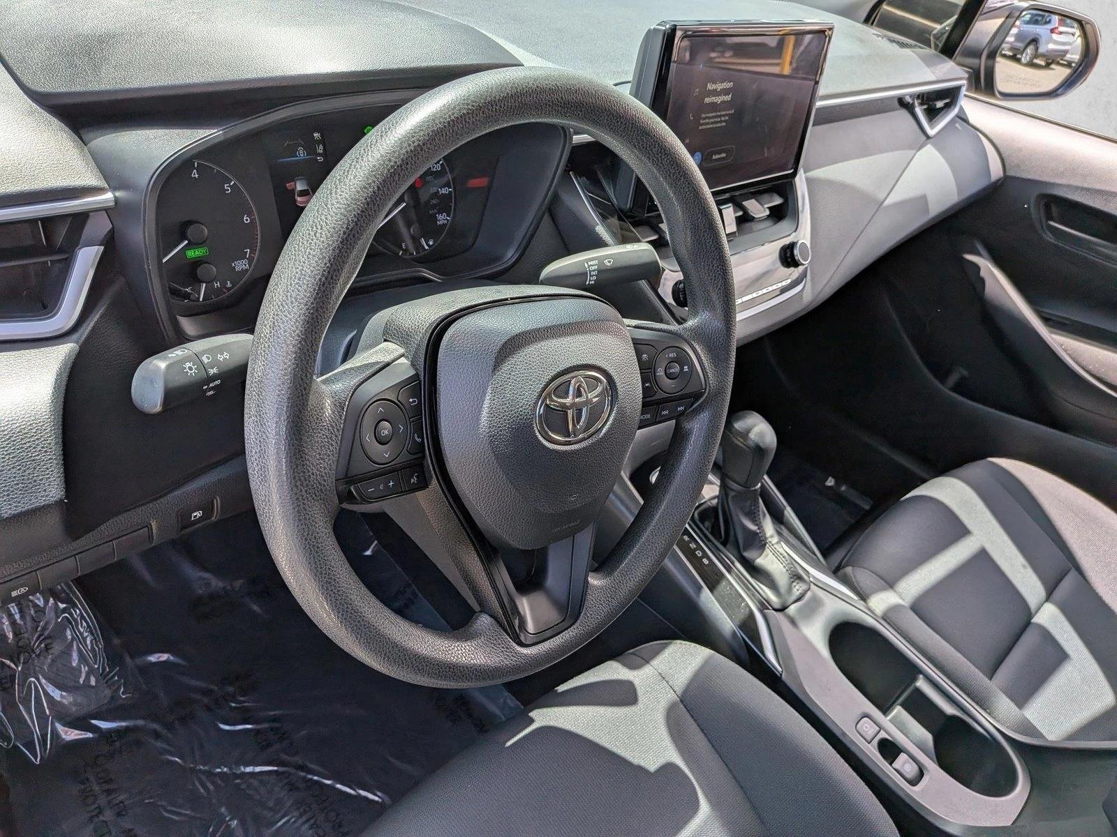 Used 2024 Midnight Black Metallic Toyota Hybrid LE image 10