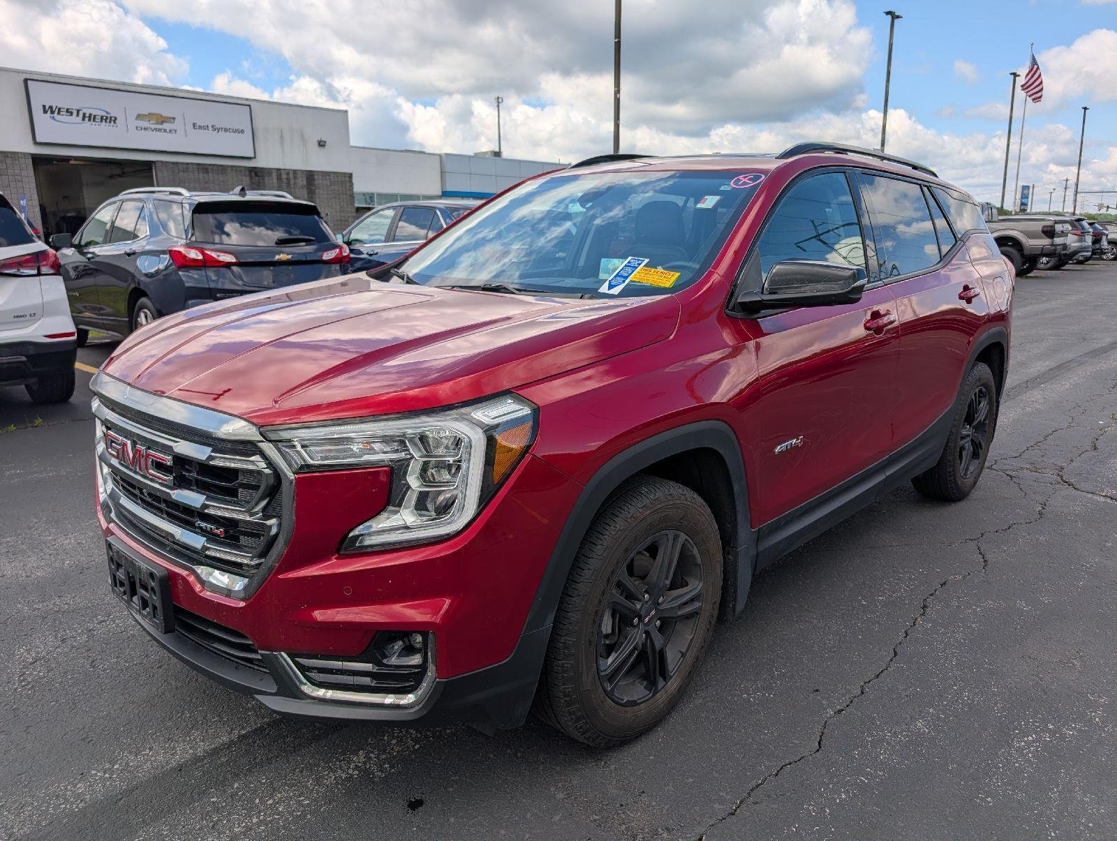 Used 2024 Volcanic Red Tintcoat GMC AT4 image 4
