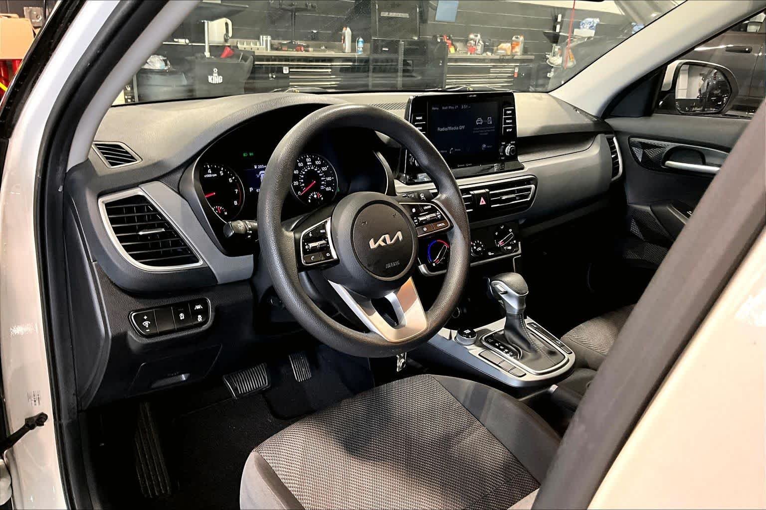 Used 2023 Snow White Pearl Kia LX image 16