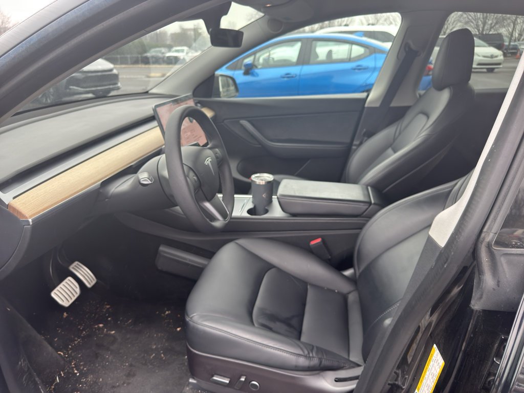 Used 2022 Solid Black Tesla Performance image 5