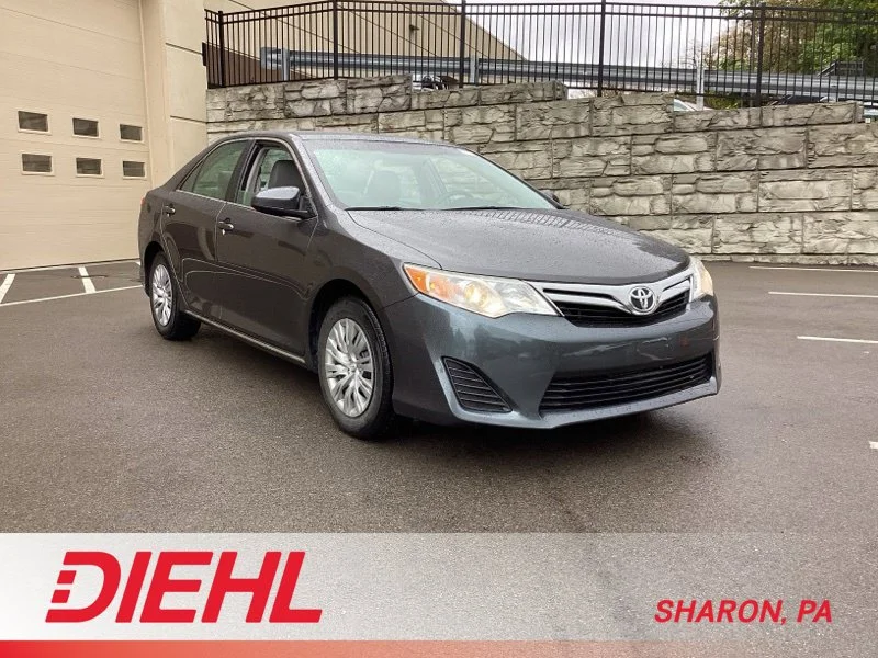 Used 2014 Magnetic Gray Metallic Toyota LE image 1