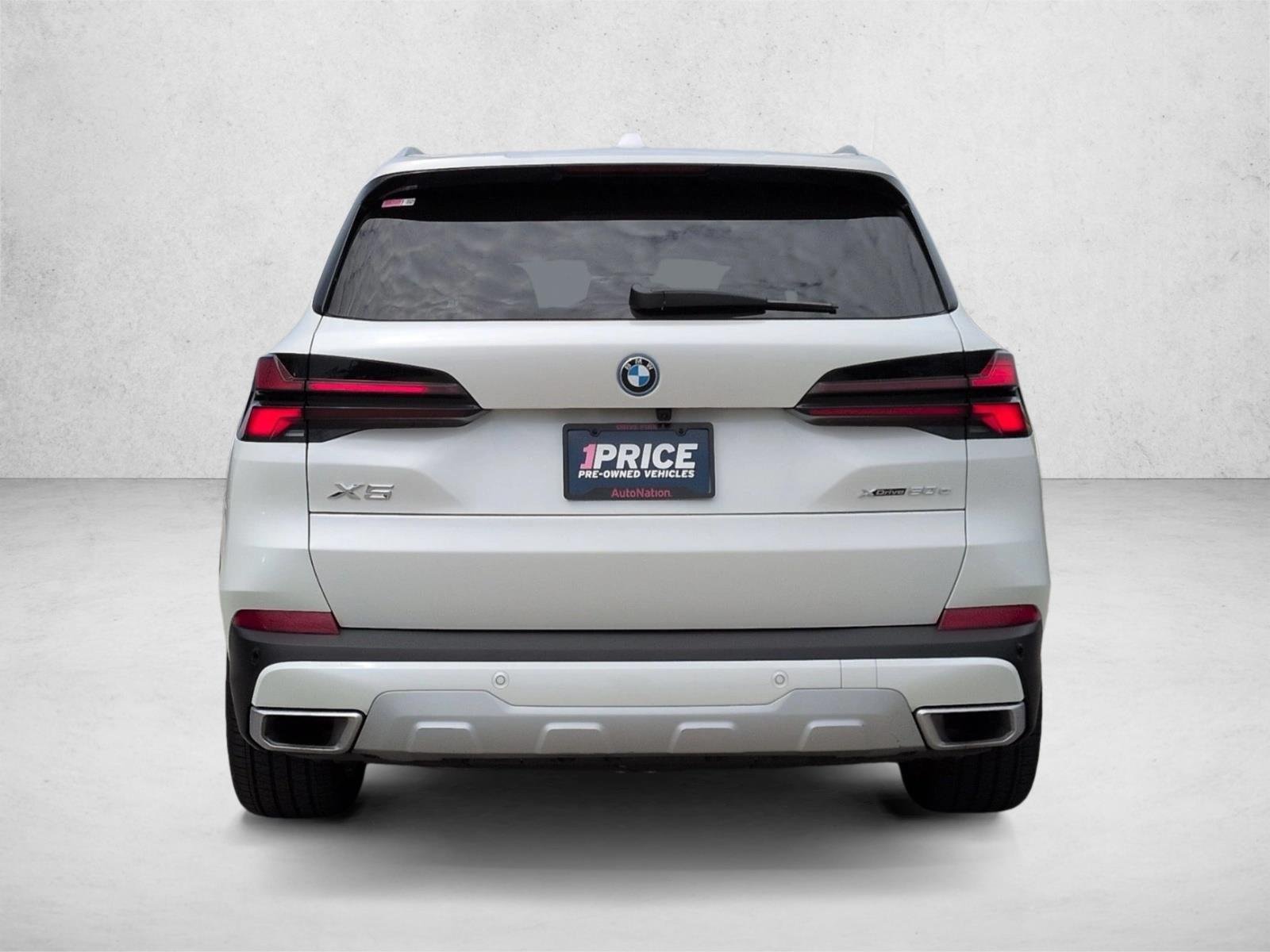 Used 2026 Mineral White Metallic BMW xDrive50e image 7