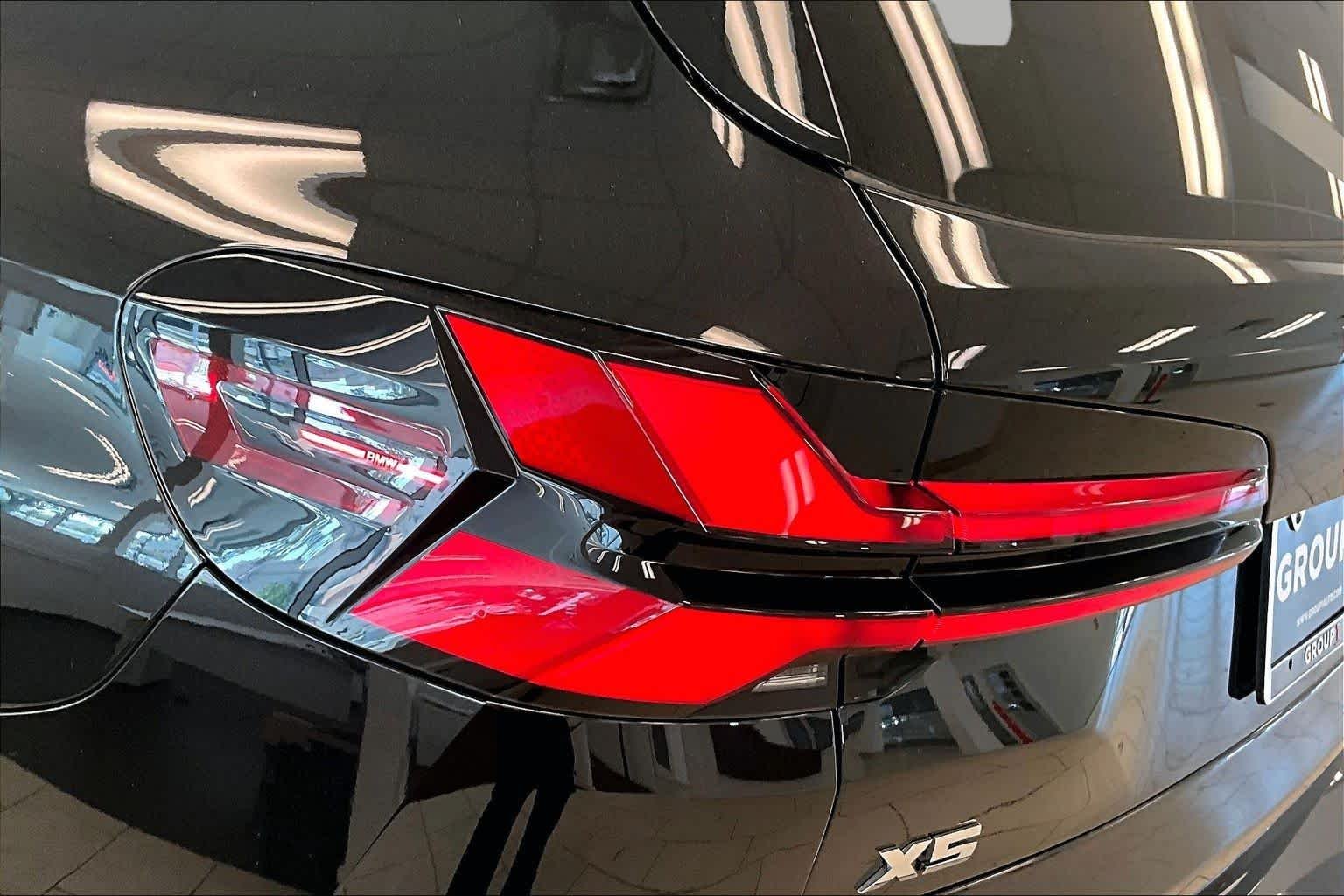 Used 2026 Black Sapphire Metallic BMW M60i image 28