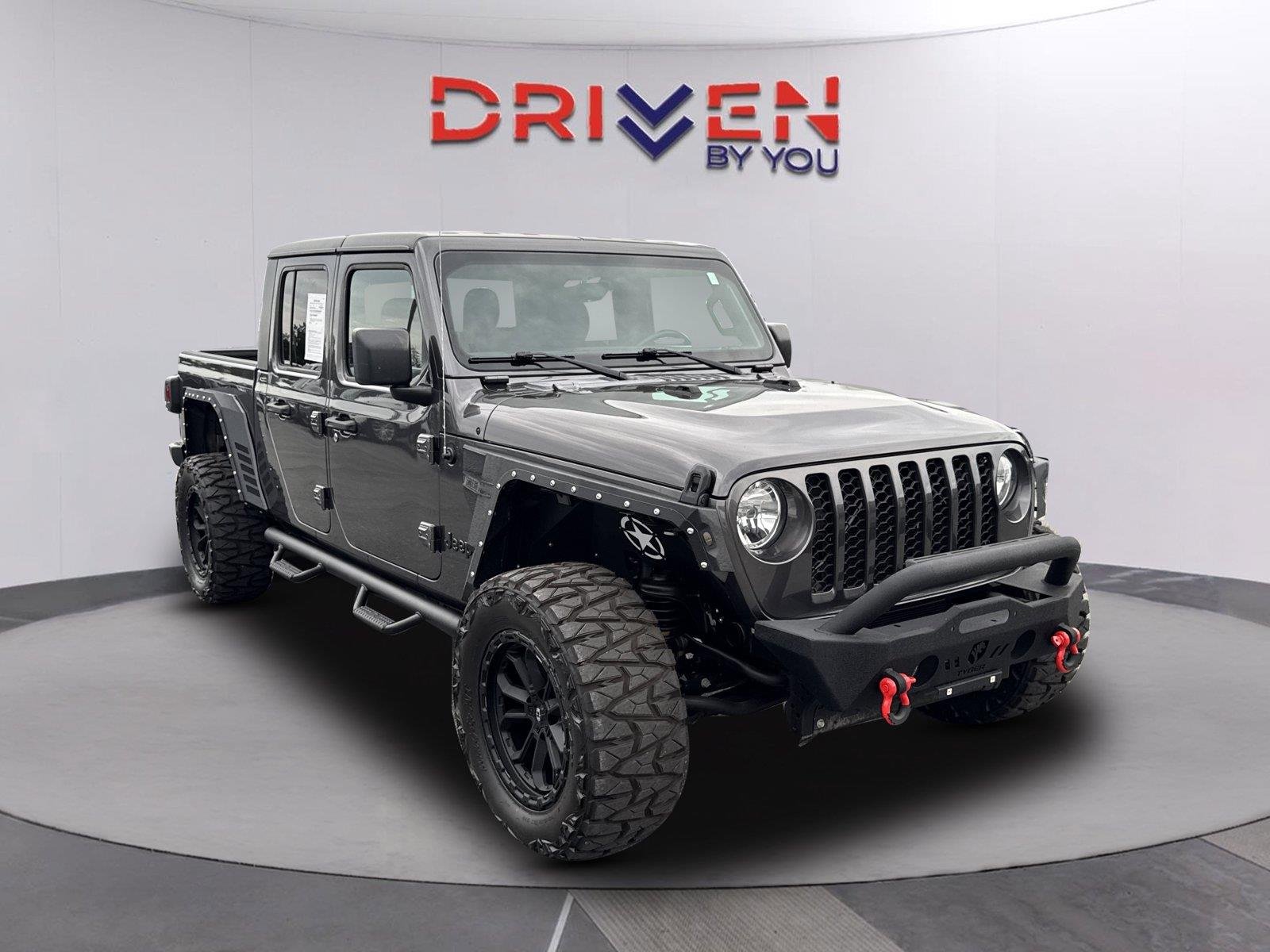 Used 2021 Granite Crystal Metallic Clearcoat Jeep Sport S image 1