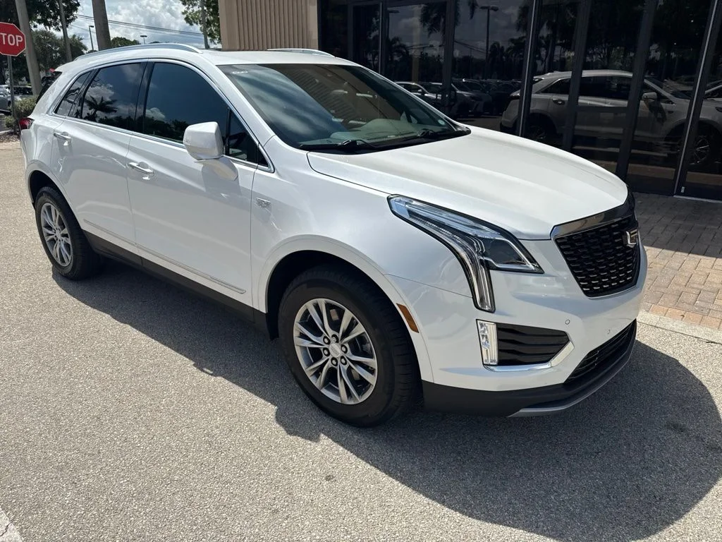 Used 2023 White Cadillac Premium Luxury image 1