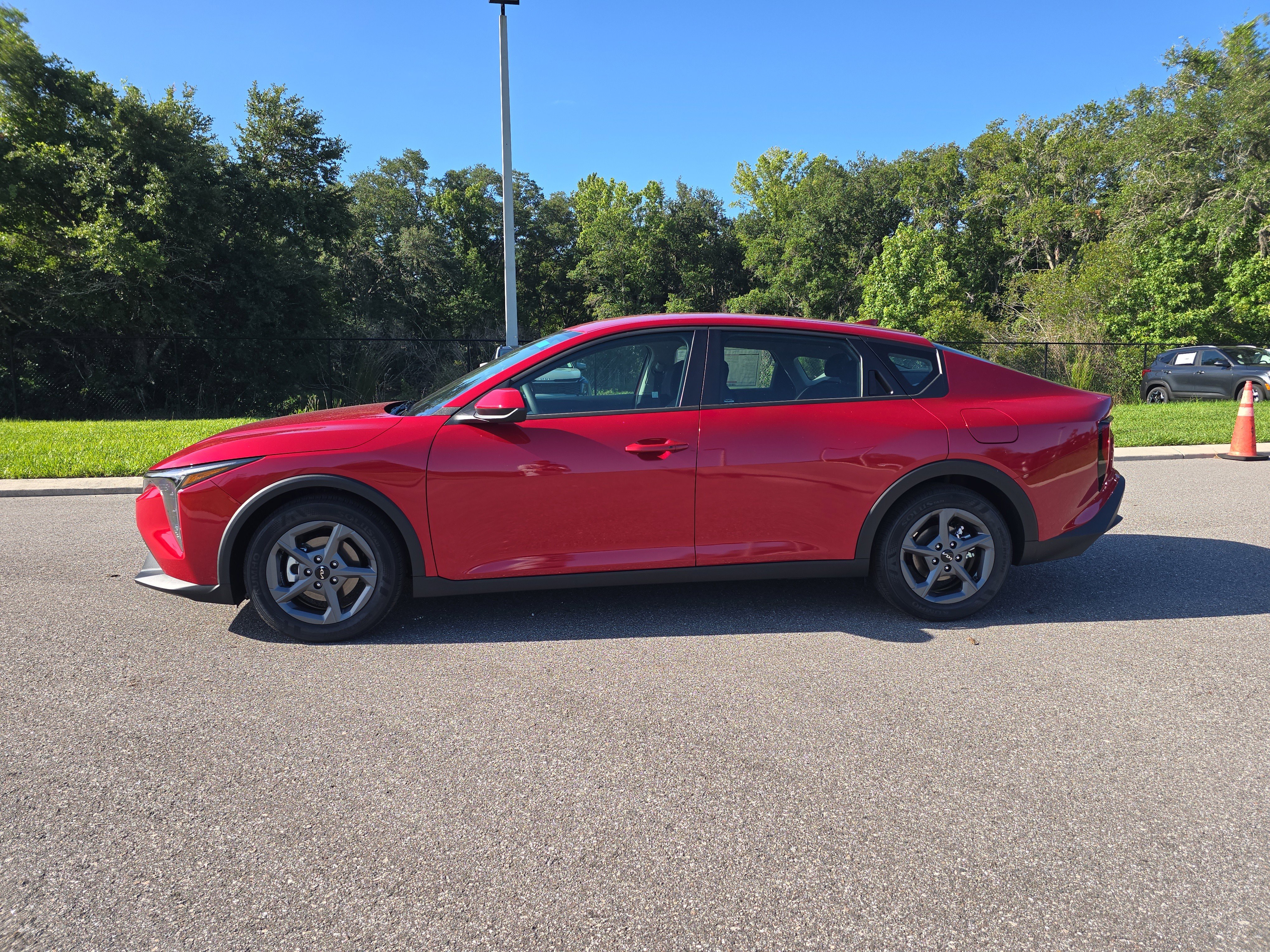 New 2026 Currant Red Kia LXS image 5