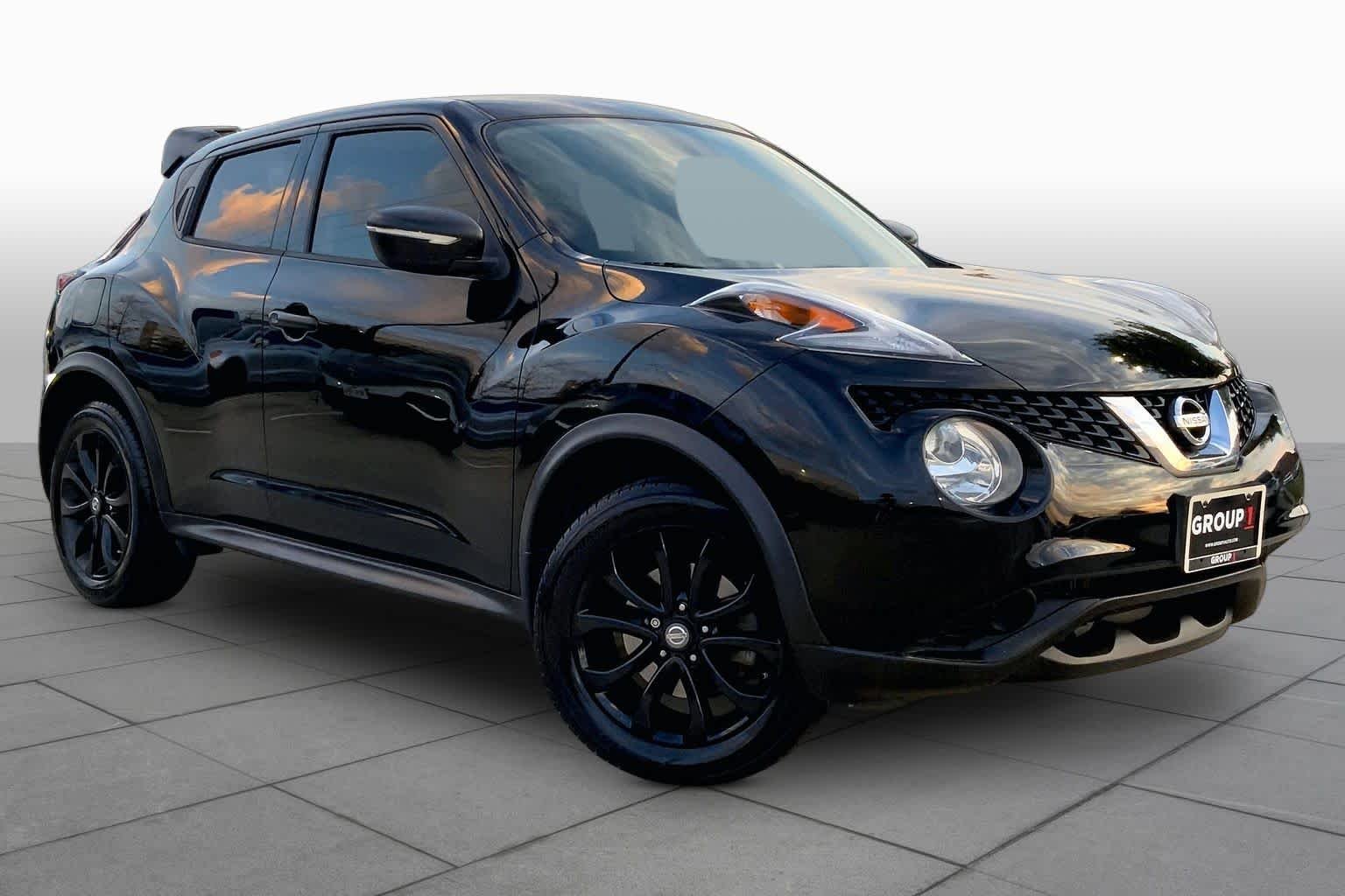 Used 2016 Super Black Nissan SV image 3