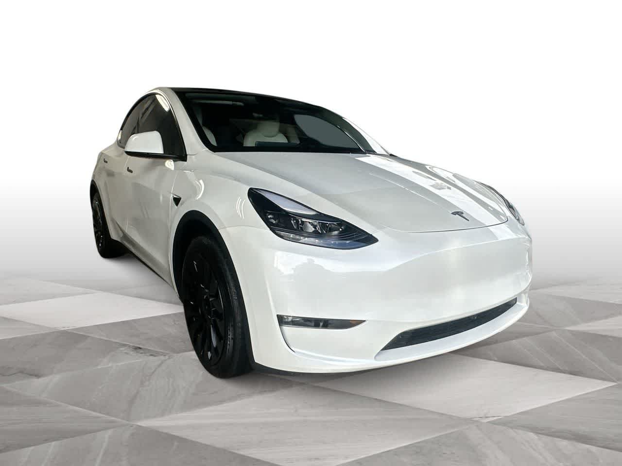 Used 2025 Tesla Model Y Long Range with VIN 7SAYGAEE4SF305310 for sale in Miami Gardens, FL