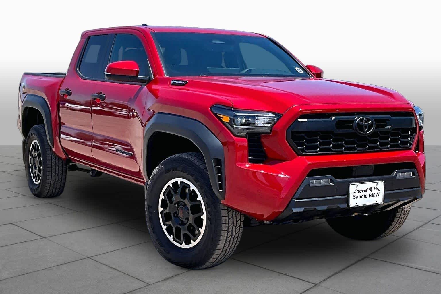 Used 2025 Supersonic Red Toyota TRD Off Road Hybrid image 2