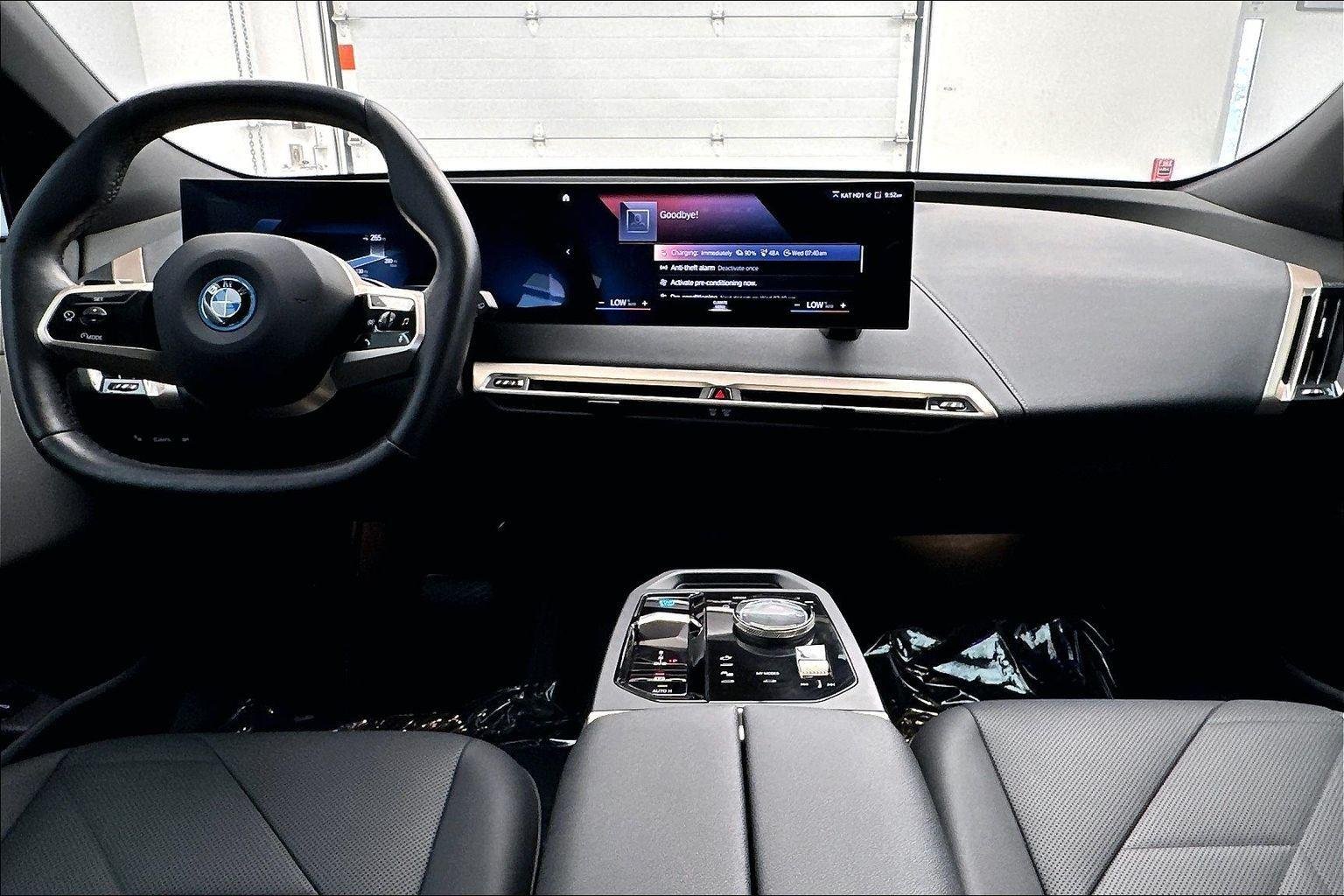 Used 2023 Oxide Grey Metallic BMW xDrive50 image 9