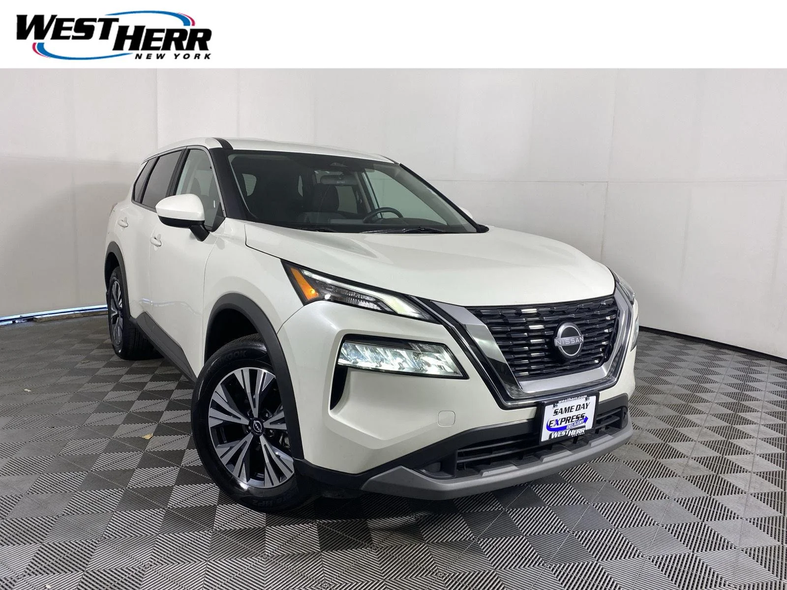 Used 2023 Pearl White Tricoat Nissan SV image 1