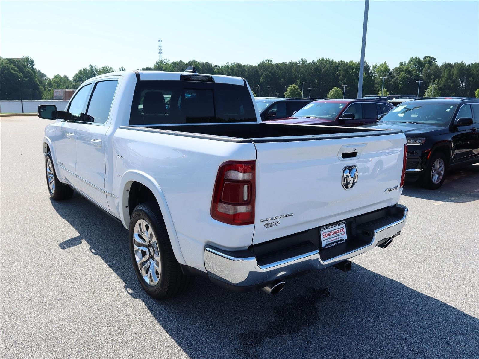 Used 2023 Bright White Clearcoat Ram Limited image 4