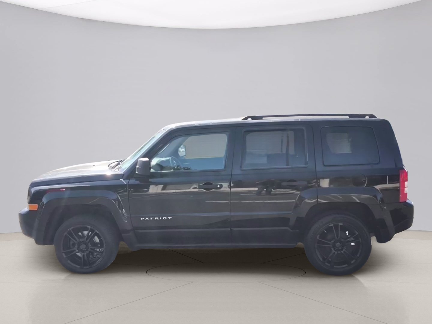 Used 2012 Black Jeep SPORT image 2