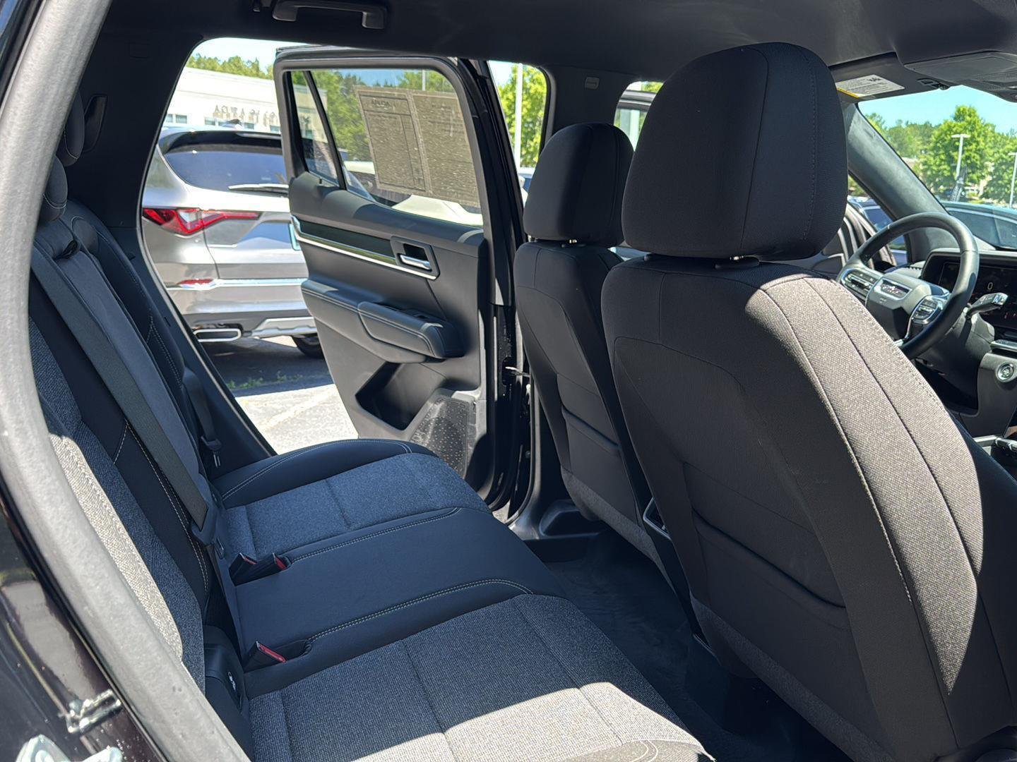 Used 2025 Ebony Twilight Metallic GMC AWD Elevation image 24