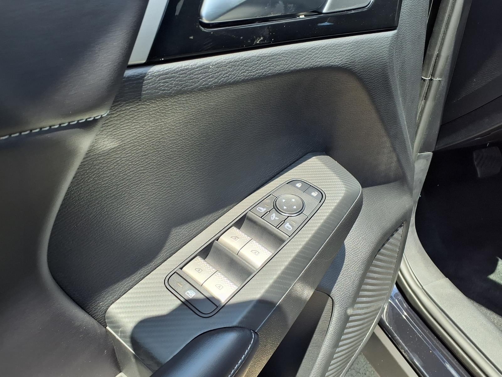 2026 Nissan Rogue Plug-In Hybrid SL Black at Sterling McCall Nissan