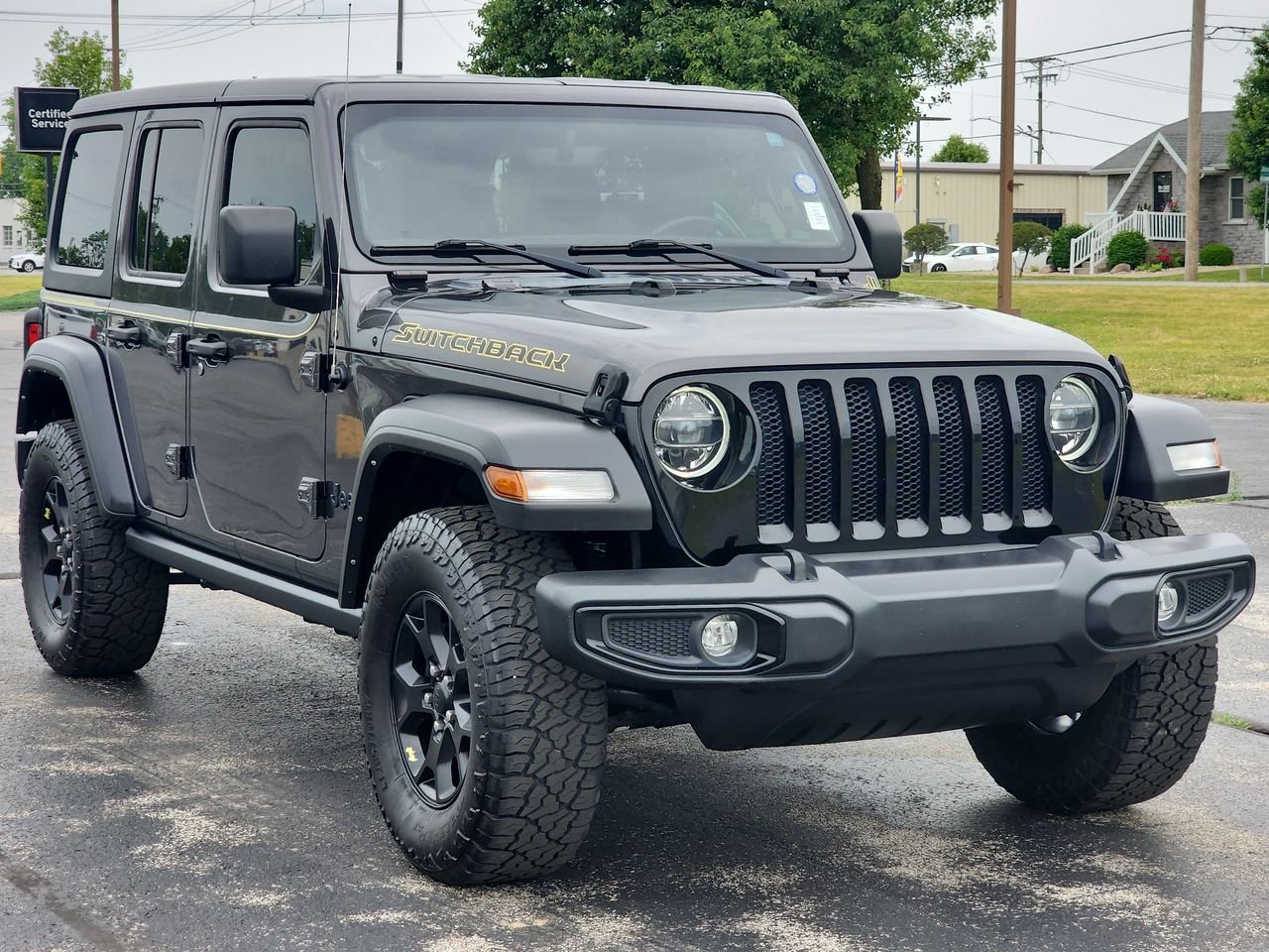 Used 2022 Granite Crystal Metallic Clearcoat Jeep Unlimited Willys image 1