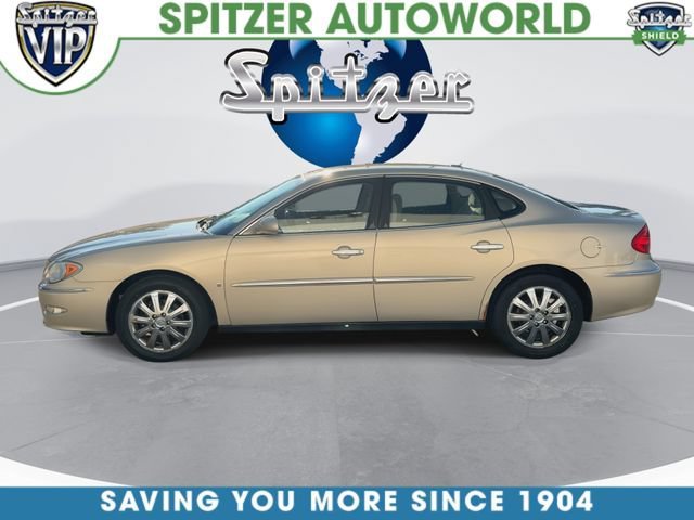 Used 2009 GOLD MIST METALLIC Buick CX image 6