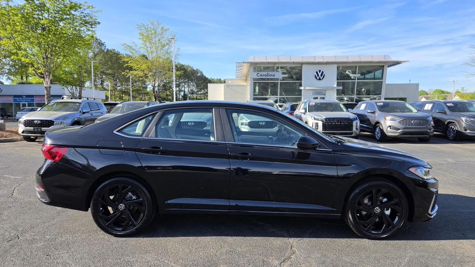 New 2026 Deep Black Pearl Volkswagen SE image 3