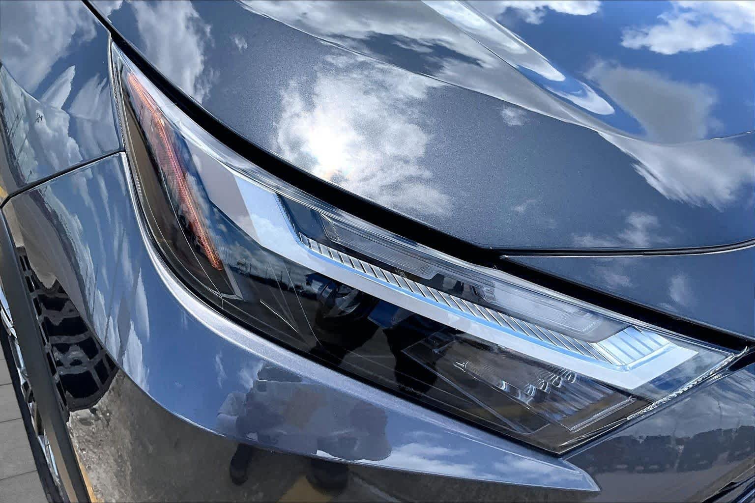 Used 2024 Magnetic Gray Metallic Toyota Hybrid XLE Premium image 28