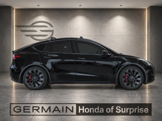 Used 2023 Solid Black Tesla Performance image 7
