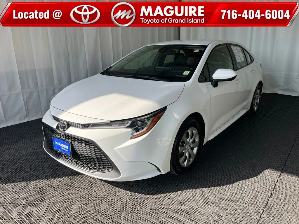Used 2021 White Toyota LE image 1