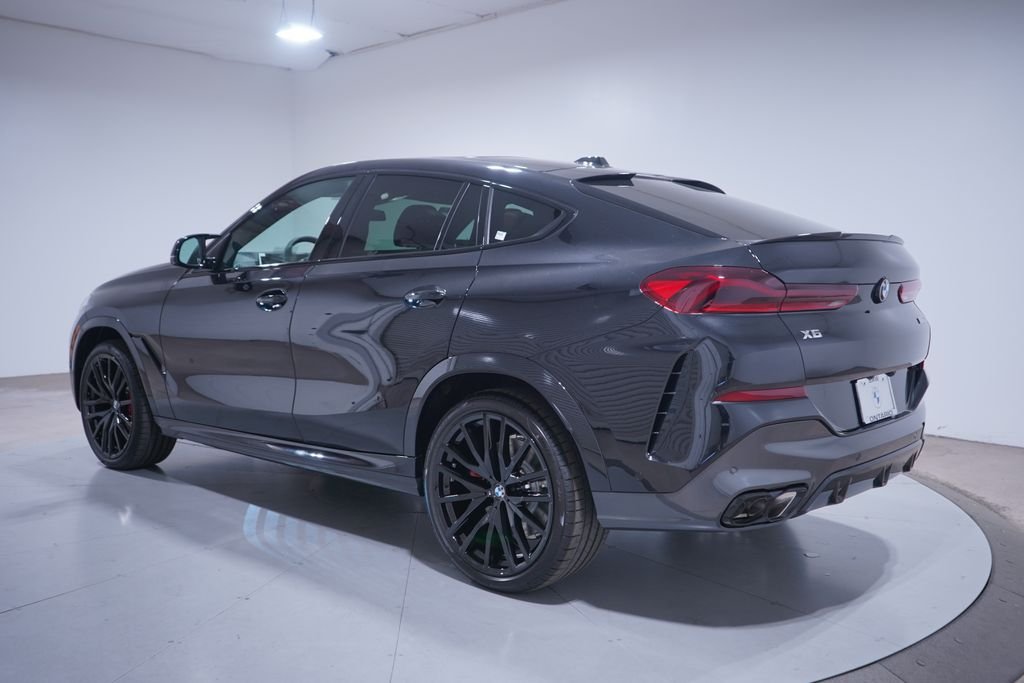 New 2026 Black Sapphire Metallic BMW M60i image 3