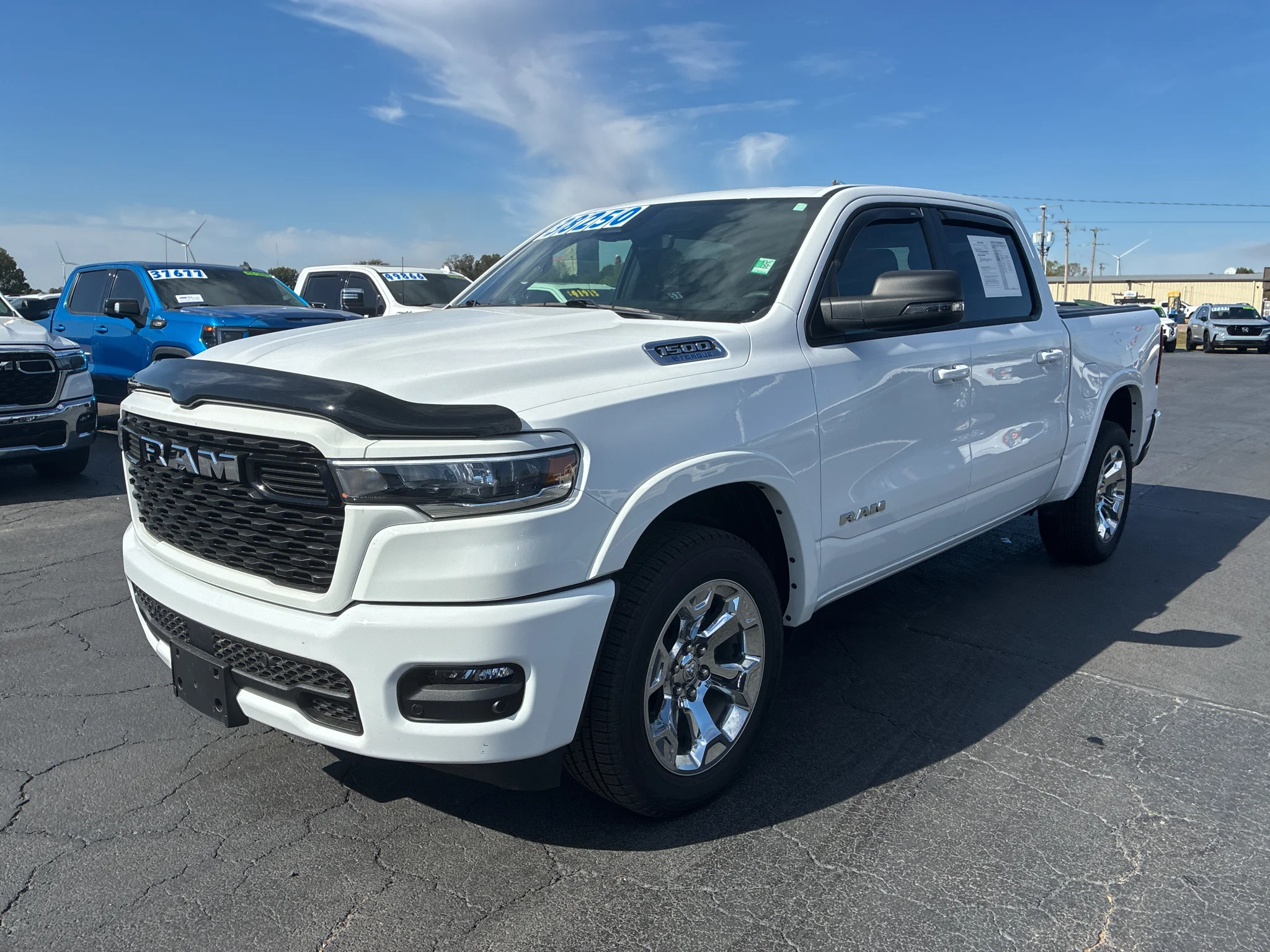 Used 2025 Bright White Clearcoat Ram Big Horn image 1