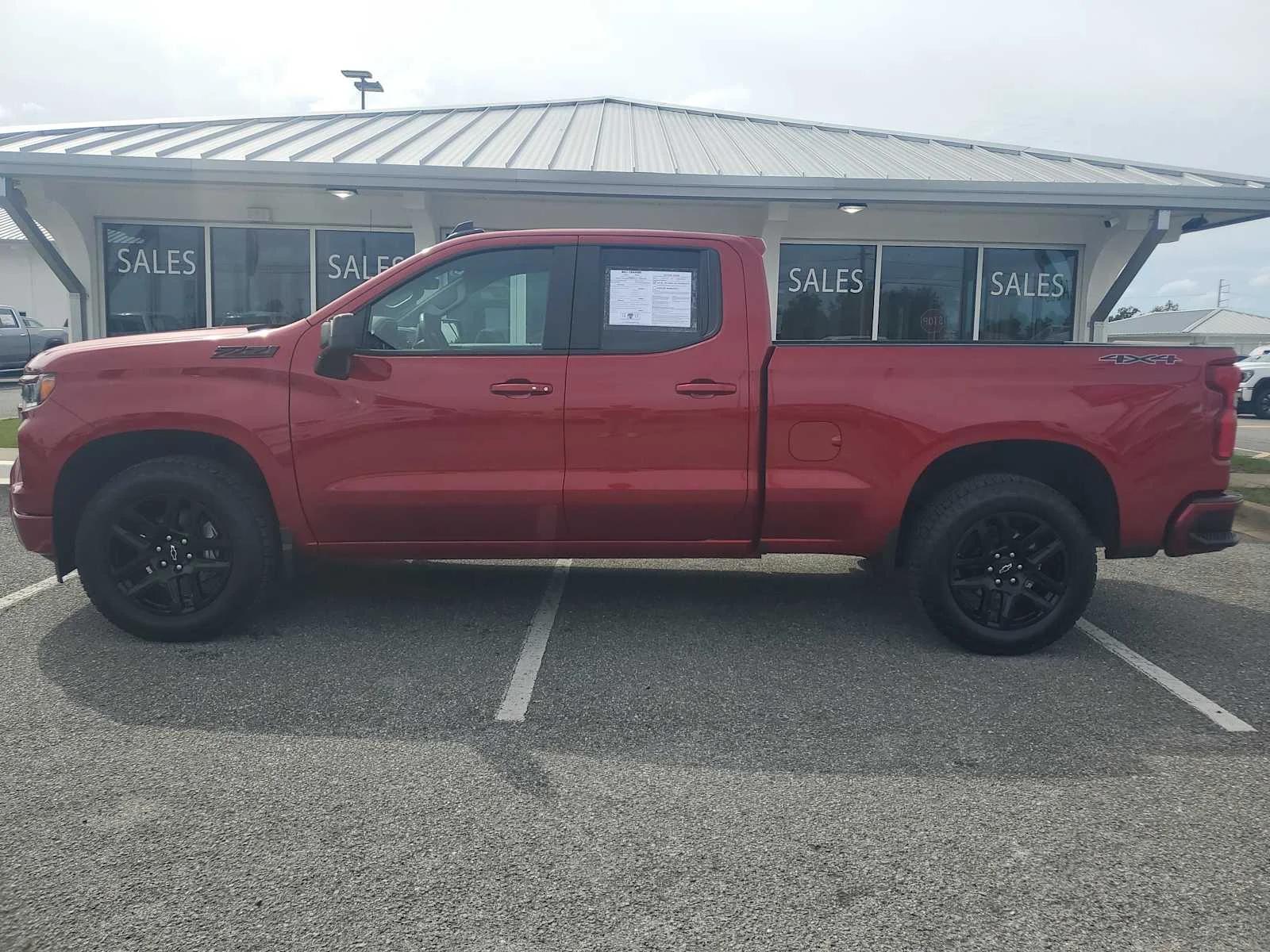 Used 2025 Radiant Red Tintcoat Chevrolet RST image 2