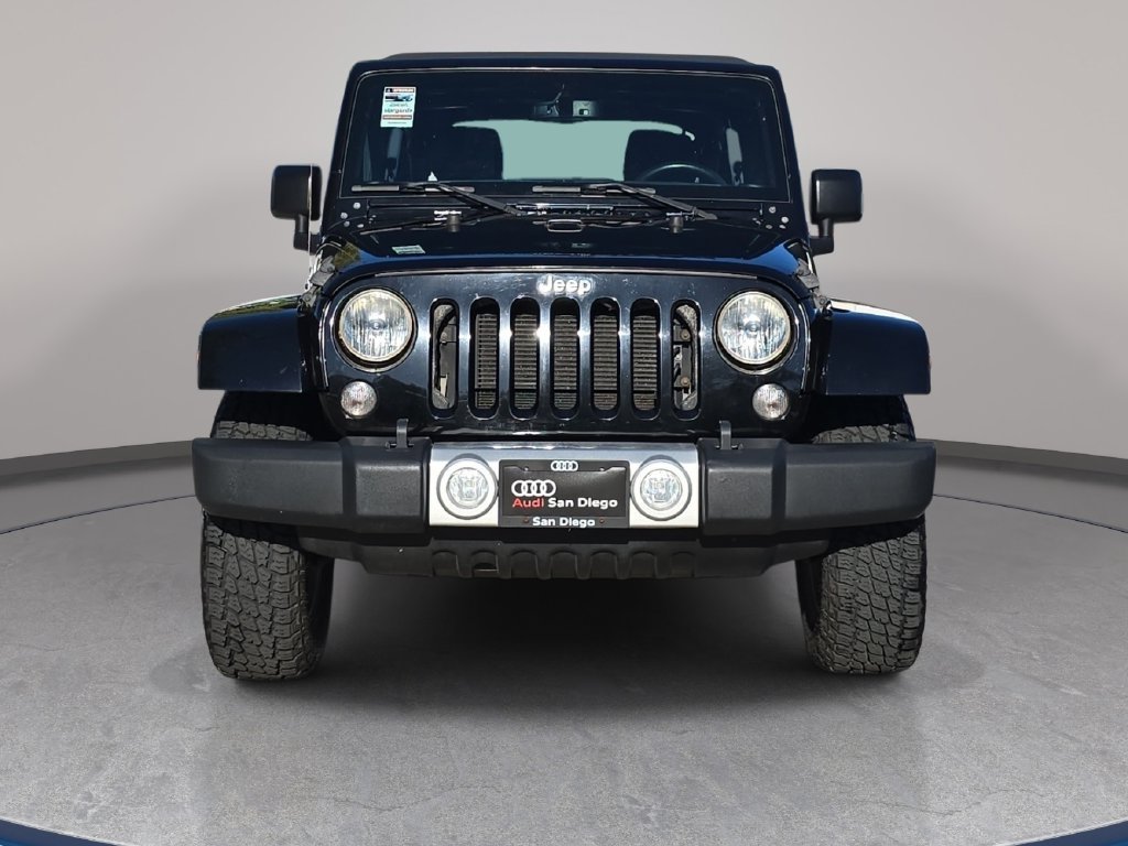 Used 2015 Black Jeep Unlimited Sahara image 3