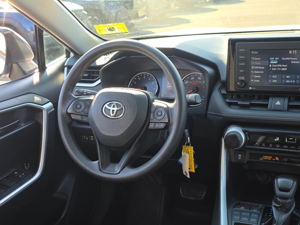 Used 2021 Super White Toyota LE image 22
