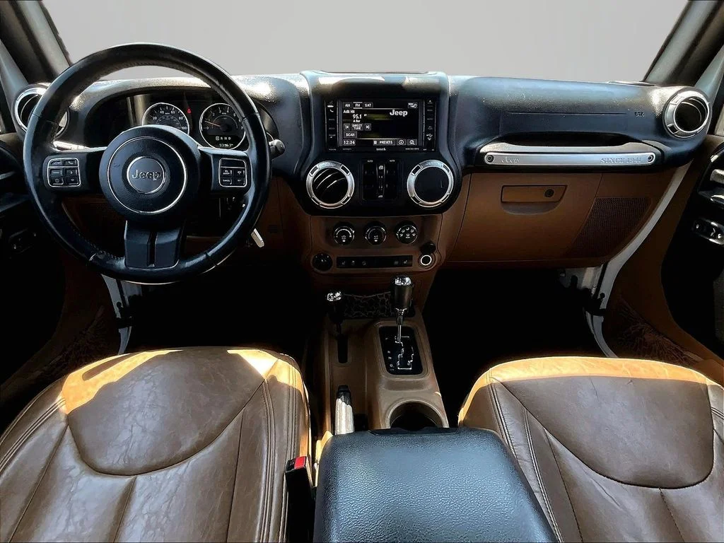 Used 2015 White Jeep Unlimited Sahara image 17