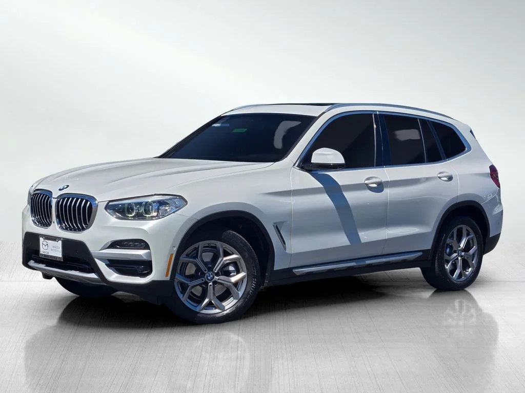Used 2021 White Metallic BMW sDrive30i image 6
