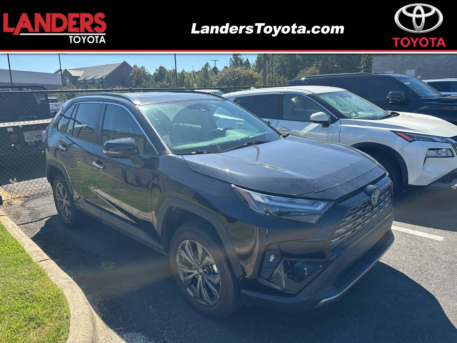 Used 2024 Midnight Black Metallic Toyota Hybrid Limited image 1